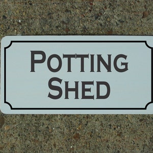 POTTING SHED Metal sign