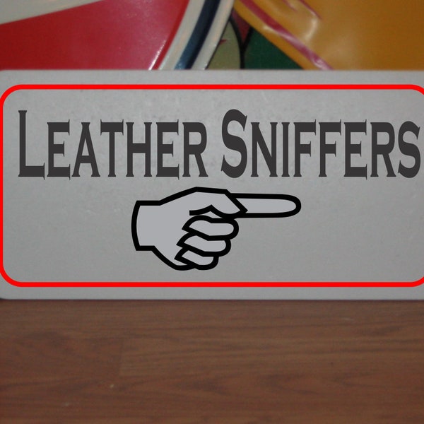 Leather Sniffers Metal Sign