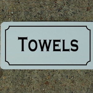 TOWELS Metal sign