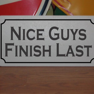 Nice Guys Finish Last Metal Sign