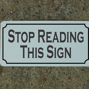 Stop Reading This Sign Metal Sign