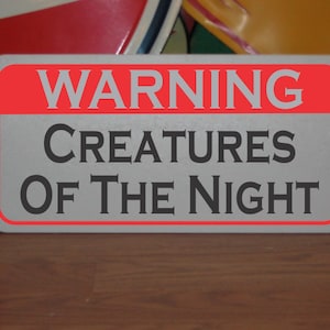 Creatures of the Night Metal Sign