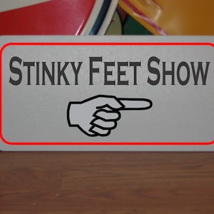 Stinky Feet Show arrow Metal Sign