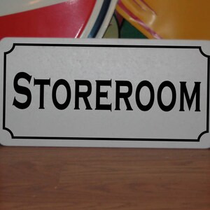 STOREROOM Metal Sign