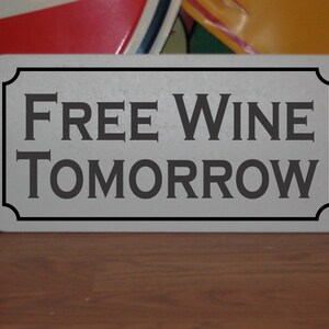 Free wine Tomorrow Metal Sign