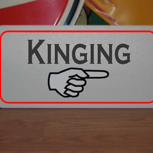 Kinging Metal Sign