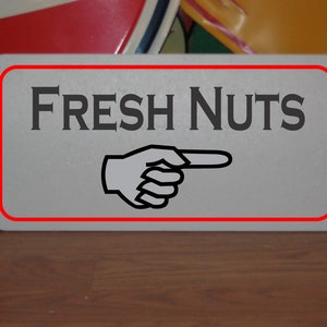 Fresh Nuts arrow Metal Sign