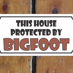 This House Protected by Bigfoot Metal Sign