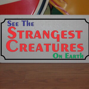 See the Strangest Creatures on Earth Metal Sign carnival circus fair