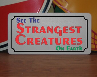 See the Strangest Creatures on Earth Metal Sign carnival circus fair