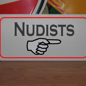 Nudists Metal Sign