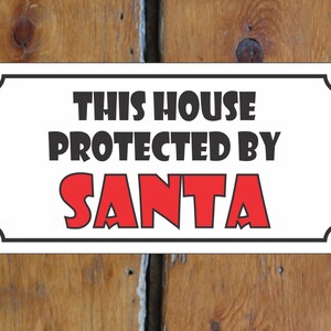This House Protected by Santa Metal Sign
