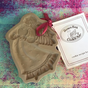 1987 Brown Bag Cookie Angel Mold with Recipe Booklet – NEW – Vintage Christmas Kitchen Decor – Never Used Holiday Baking Mold