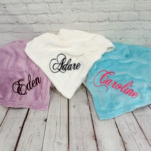 May include: A set of three ceramic mugs with a speckled, matte finish. The mugs are in shades of cream, light gray, and dark gray. Each mug has a simple, minimalist design, perfect for coffee or tea.