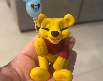 Happy Pooh Bear with Mickey Balloon
