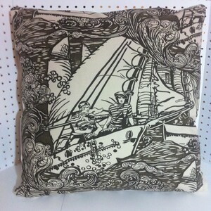 May include: A decorative pillow with a black and white illustration of two people on a sailboat in a stormy sea. The background is filled with swirling waves and clouds.