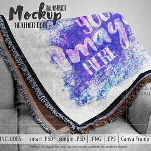 May include: A white woven blanket with a watercolour design of blue, purple and pink flowers and the text "you may here". The blanket has fringe on all sides.