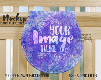 Dye sublimation peanut shaped burp cloth on crib mockup | Add your own image and background