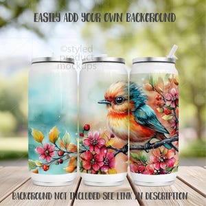 May include: Three white insulated tumblers with silver lids. The tumblers feature watercolor designs of a bird perched on a branch with pink flowers and berries. The text "EASILY ADD YOUR OWN BACKGROUND" and "BACKGROUND NOT INCLUDED SEE LINK IN DESCRIPTION" are visible.