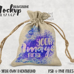 May include: A small, beige drawstring bag with a purple and blue watercolour design. The bag is 4.7 inches by 6.7 inches and has the text "YOUR IMAGE HERE" on it.