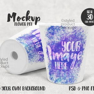 May include: A white flower pot mockup with a watercolor design featuring purple, blue, and pink hues. The text "YOUR IMAGE HERE" is written in white on the pot. The pot is on a gray background.