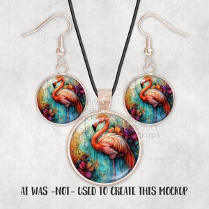 May include: A jewellery set with a flamingo design. The set includes a pendant necklace and a pair of earrings. Each piece has a round, silver-toned frame with a colourful flamingo illustration. The flamingo is in pink and orange, set against a teal and floral background.