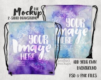 May include: Two-sided drawstring bag mockup with a watercolor background featuring a floral wreath and the text "YOUR IMAGE HERE". The bag is purple and blue with a white floral design. The text "ADD YOUR OWN BACKGROUND" is also included.