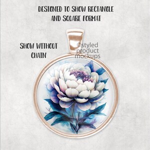 May include: A round glass pendant with a gold metal frame. The pendant features a watercolour painting of a white peony flower with blue and purple accents.