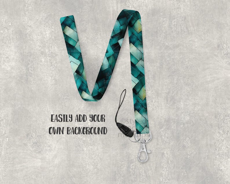 May include: A teal and white patterned lanyard with a black clasp and silver-colored metal clip. The lanyard has the text "EASILY ADD YOUR OWN BACKGROUND".