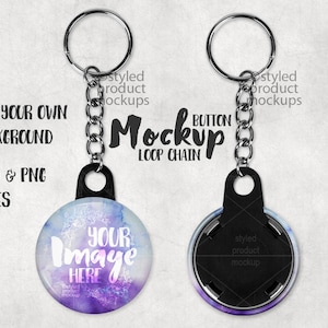 May include: Two silver keychains with black button-shaped charms. One charm has a purple and blue watercolor design with the text "Your Image Here". The other charm is black with the text "styled product mockup".