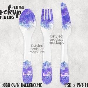 May include: A set of three colorful plastic children's cutlery, including a spoon, fork, and knife. The cutlery is decorated with a purple and blue watercolor design. The text "YOUR IMAGE HERE" is printed on each piece.