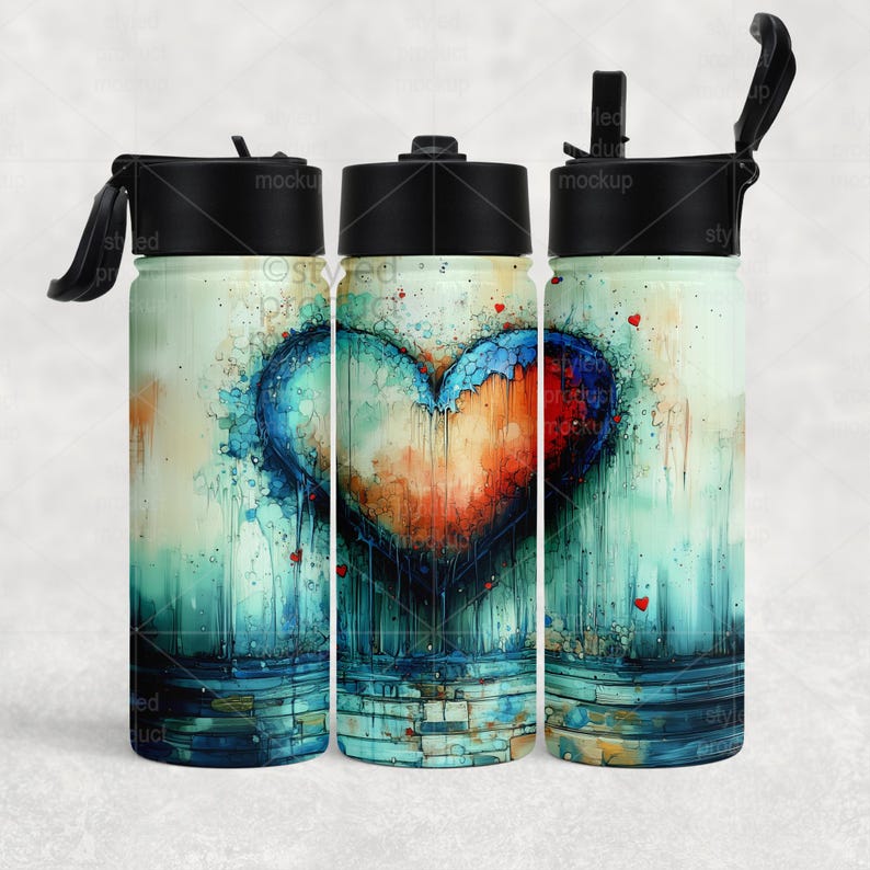 May include: Insulated water bottle with a black lid and a watercolor heart design. The heart is a mix of blue, orange, and red hues, set against a light green background. Small red hearts are scattered around the design.