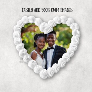 May include: A heart-shaped frame with a white, textured border, filled with a photo of a smiling couple. The frame is set against a textured, off-white background. Text at the top reads "EASILY ADD YOUR OWN IMAGES".