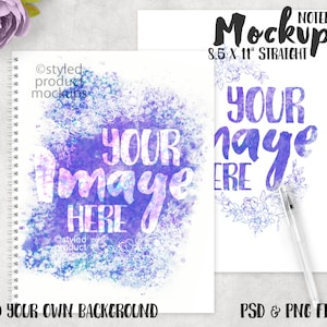 May include: Mockup of an 8.5 x 11 inch spiral bound notebook with a watercolour background featuring purple and blue hues. The text "Your Image Here" is written in a handwritten font. The notebook is on a grey surface.