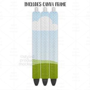 May include: Three pens with a textured design. The pens have a light blue and white pattern, with a green textured grip and black tips. The text "INCLUDES CANVA FRAME" is at the top.