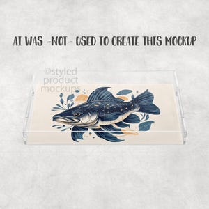 May include: Clear acrylic serving tray featuring a detailed illustration of a blue and white fish with botanical accents. The tray has a rectangular shape with raised edges. Text on the tray reads "AI WAS -NOT- USED TO CREATE THIS MOCKUP".