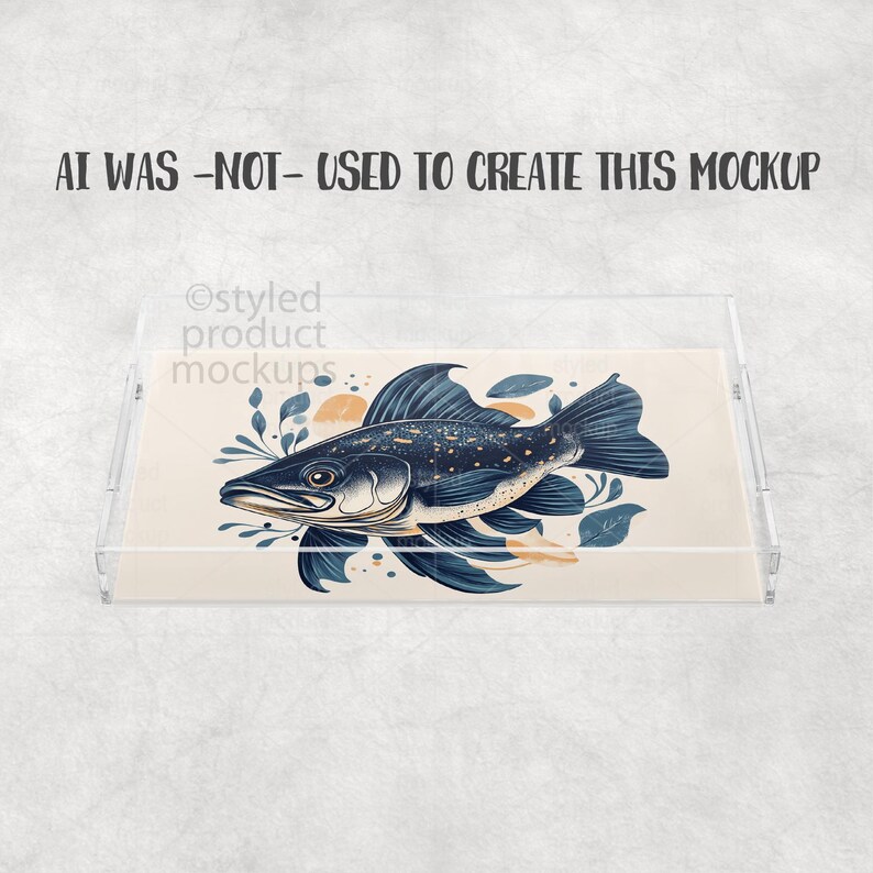 May include: Clear acrylic serving tray featuring a detailed illustration of a blue and white fish with botanical accents. The tray has a rectangular shape with raised edges. Text on the tray reads "AI WAS -NOT- USED TO CREATE THIS MOCKUP".