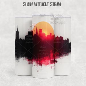 May include: Three white insulated tumblers with a New York City skyline design. The design features a black silhouette of buildings, a red and orange sunset, and the text "SHOW WITHOUT STRAW".