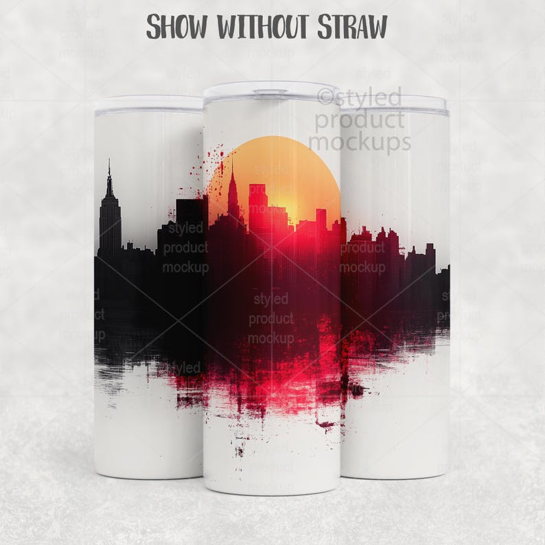 May include: Three white insulated tumblers with a New York City skyline design. The design features a black silhouette of buildings, a red and orange sunset, and the text "SHOW WITHOUT STRAW".