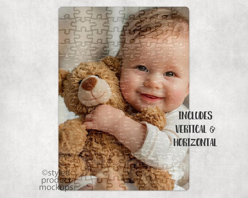 May include: A baby holding a brown teddy bear. The baby is wearing a white shirt and has a happy expression. The image includes the text "INCLUDES VERTICAL & HORIZONTAL".