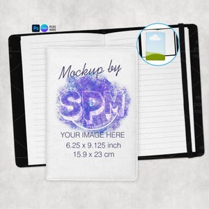 May include: Open black notebook with lined pages, featuring a white cover with the text "Mockup by SPM" over a purple and blue design. The cover also includes the text "YOUR IMAGE HERE" and dimensions of 6.25 x 9.125 inches and 15.9 x 23 cm.
