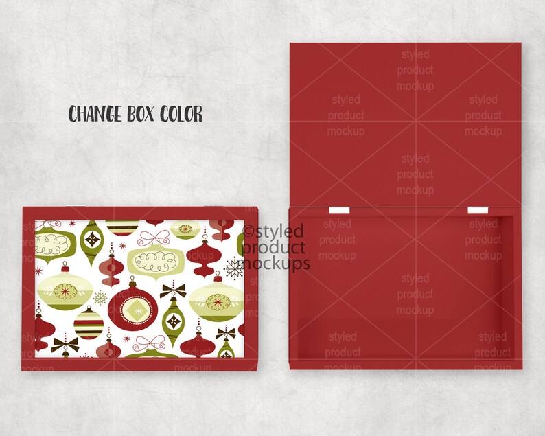 May include: A red box with an open lid, showing the inside. The box on the left has a lid with a white background and a pattern of green, red, and white Christmas ornaments. The text "CHANGE BOX COLOR" is at the top.
