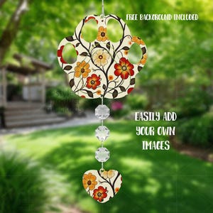 May include: A floral wind chime with a paw-shaped top, a heart-shaped bottom, and three crystal beads. The design features orange and red flowers on a cream background. Text on the image reads "FREE BACKGROUND INCLUDED" and "EASILY ADD YOUR OWN IMAGES."