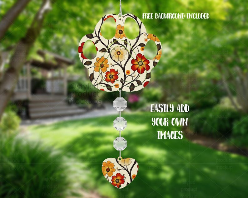 May include: A floral wind chime with a paw-shaped top, a heart-shaped bottom, and three crystal beads. The design features orange and red flowers on a cream background. Text on the image reads "FREE BACKGROUND INCLUDED" and "EASILY ADD YOUR OWN IMAGES."