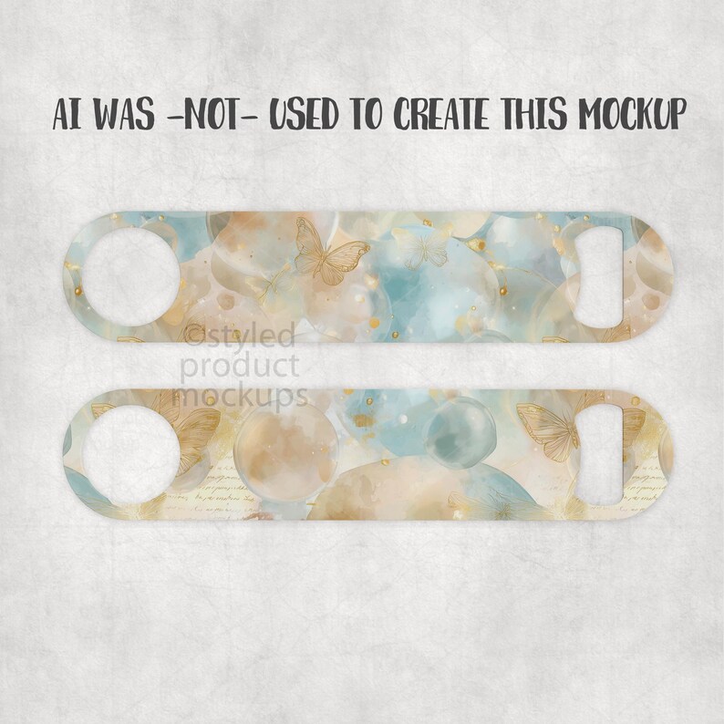 May include: Two bottle openers with a watercolor design featuring butterflies, gold accents, and a blue and beige color scheme. The text "AI WAS -NOT- USED TO CREATE THIS MOCKUP" is at the top.