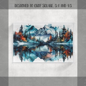 May include: A rectangular tray featuring a watercolor landscape of mountains, trees, and a lake. The artwork uses shades of blue, orange, and green, with a mirrored reflection in the water. The tray is framed in a clear, rectangular border.