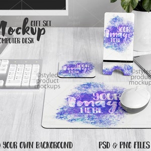 May include: A computer desk mockup with a white keyboard, a white mouse, a phone stand, and two coasters. The phone stand and coasters have a watercolor design with the text "Your Image Here".