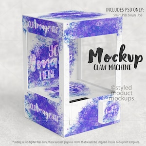 Könnte beinhalten: Weißer Krallenautomaten-Mockup mit einem lila und blauen Aquarellhintergrund. Der Text "Your Image Here" befindet sich an den Seiten der Maschine. Der Text "Mockup Claw Machine" befindet sich an der Vorderseite der Maschine.