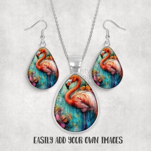 May include: A silver-toned jewelry set featuring a flamingo design. The set includes a pendant necklace and matching teardrop earrings. The flamingo is depicted in shades of orange and pink against a teal background with floral accents. The text "EASILY ADD YOUR OWN IMAGES" is at the bottom.
