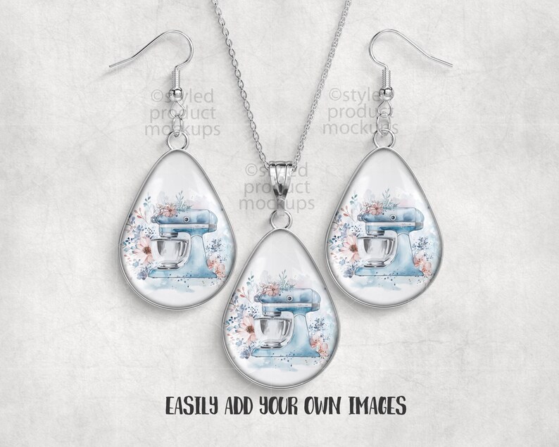 May include: A silver-toned jewelry set featuring a pendant necklace and matching teardrop earrings. Each piece showcases a light blue stand mixer design with floral accents. The text "EASILY ADD YOUR OWN IMAGES" is at the bottom.